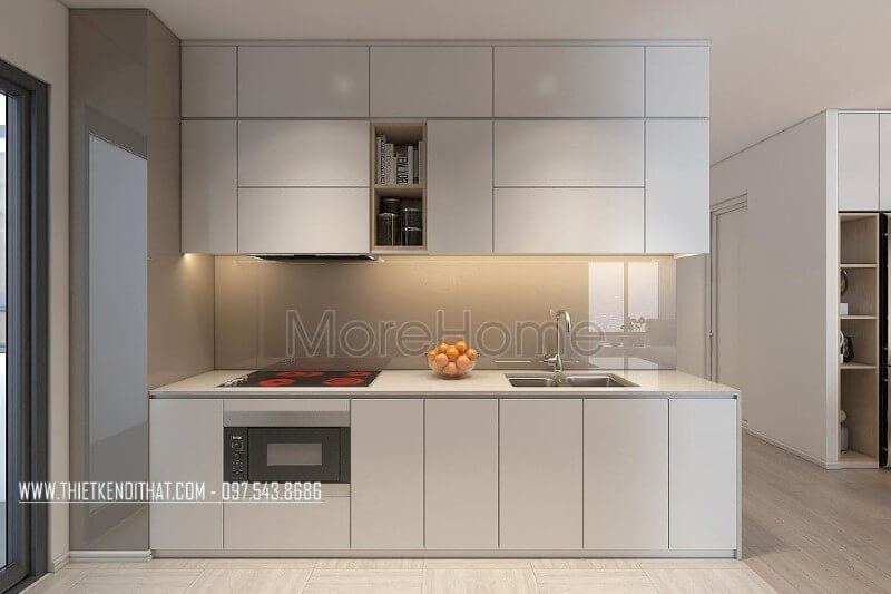 Mẫu tủ bếp kiểu dáng chữ i gỗ acrylic màu trắng kết hợp phân chia các ngăn tủ một cách hợp lí, tạo cho người nội trợ thuận tiện hơn trong quá trình mang lại những bữa cơm ngon miệng cho những người thân yêu của mình Tủ bếp hiện đại, tủ bếp chữ u, tủ bếp chữ i, tủ bếp chữ l