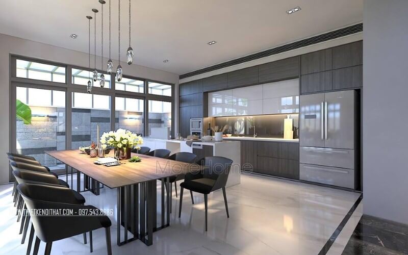 Bộ bàn ghế ăn, đèn thả, tủ bếp acrylic, laminate đã tạo nên vẻ đẹp sang trọng, độc đáo cho phòng ăn liền bếp. Mẫu nội thất biệt thự đẹp