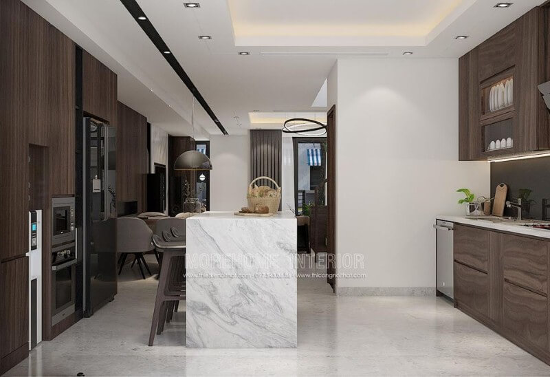 Phòng bếp đẹp độc đáo với ý tưởng thiết kế tủ bếp đảo từ gỗ sậm màu kết hợp bàn đảo ốp đá sang trọng. Thiết kế chung cư
