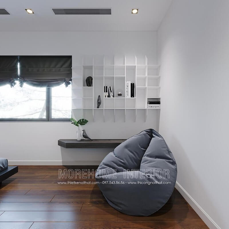 Kệ trang trí sơn trắng kết hợp cùng bàn gỗ óc chó ốp tường đơn giản nhưng lại tạo nên vẻ đẹp độc đáo, mới lạ cho không gian đọc sách trong phòng ngủ. Mẫu nội thất biệt thự đẹp