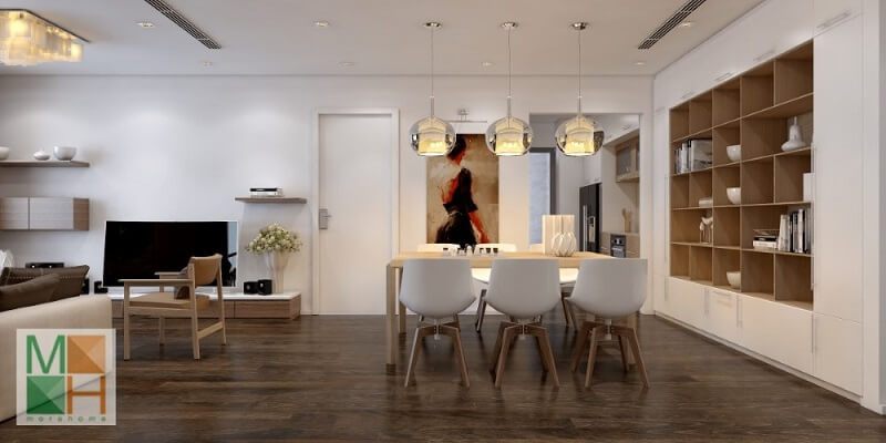 Thiết kế nội thất phòng ăn chung cư hiện đại với tông màu sáng được sử dụng mang lại sự thư giãn và sạch sẽ cho căn nhà. Khu vực bàn ăn được chú ý với một tủ gỗ tiện dụng.