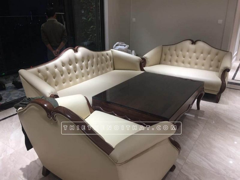 Bàn trà gỗ óc chó lớn mặt kính cường lực giúp bảo vệ bề mặt gỗ luôn mới