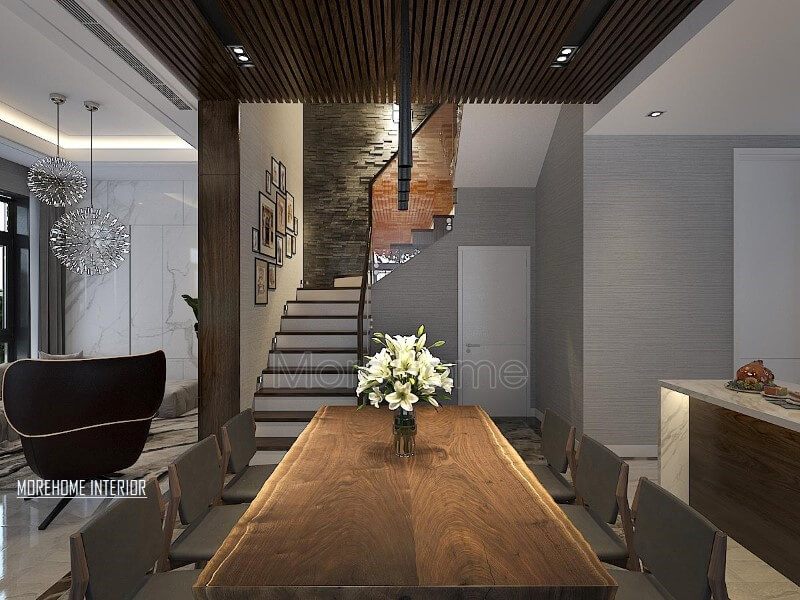 Thay vì sự tròn trịa hay sự lấp lánh ánh kim vật liệu nhân tạo thì chiếc bàn ăn gỗ óc chó nguyên tâm với vẻ đẹp tự nhiên mộc mạc nhưng huyền ảo từ đường vân đến sắc trầm sẽ giúp cho phòng ăn hiện đại thêm độc đáo, sang trọng.