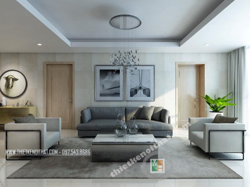 Phòng khách chung cư tiện nghi với bộ sofa vải màu xám và trắng mang đến vẻ đẹp đơn giản, tinh tế cho căn phòng.