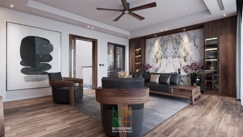 Bộ ghế sofa gỗ óc chó hiện đại được đặt ở vị trí trung tâm của căn phòng góp phần tạo nên giá trị thẩm mỹ cho không gian sống mỗi gia đình.